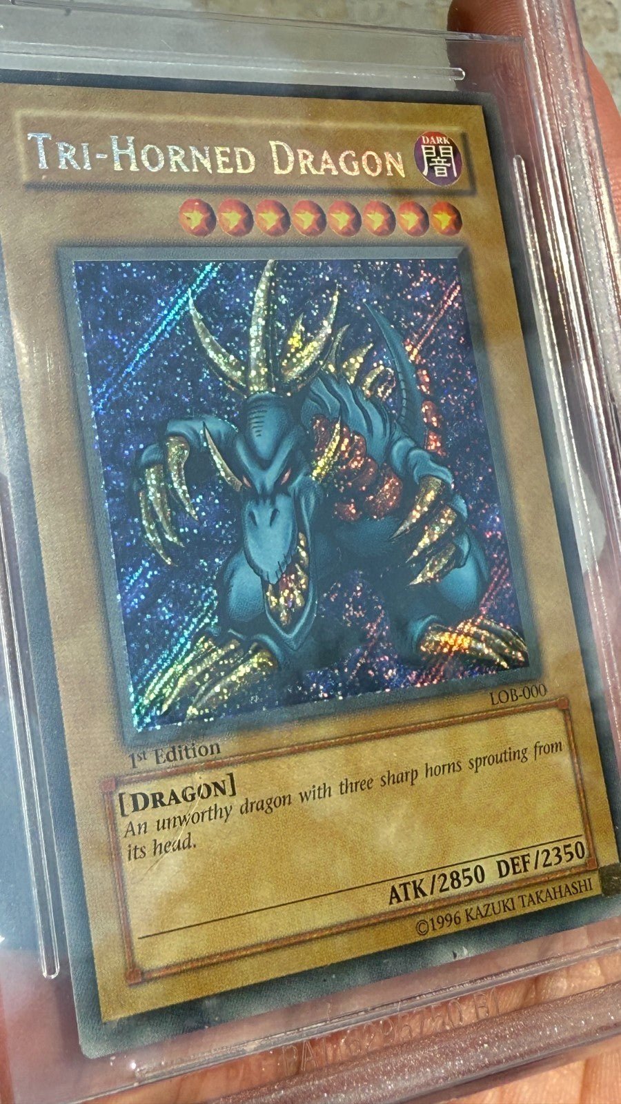 2002 YuGiOh Tri - Horned Dragon 1st Edition Secret LOB - 000 BGS 8.5 PSA NA English
