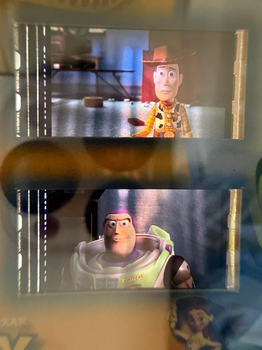 2004 UPPER DECK DISNEY PIXAR TOY STORY 2 Reel Piece of History PSA 8 MISPRINT?